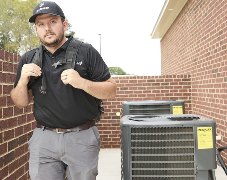 A service technician leaving the job site