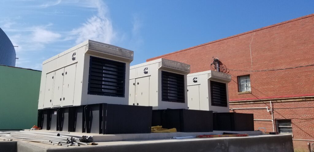 Three rooftop HVAC units