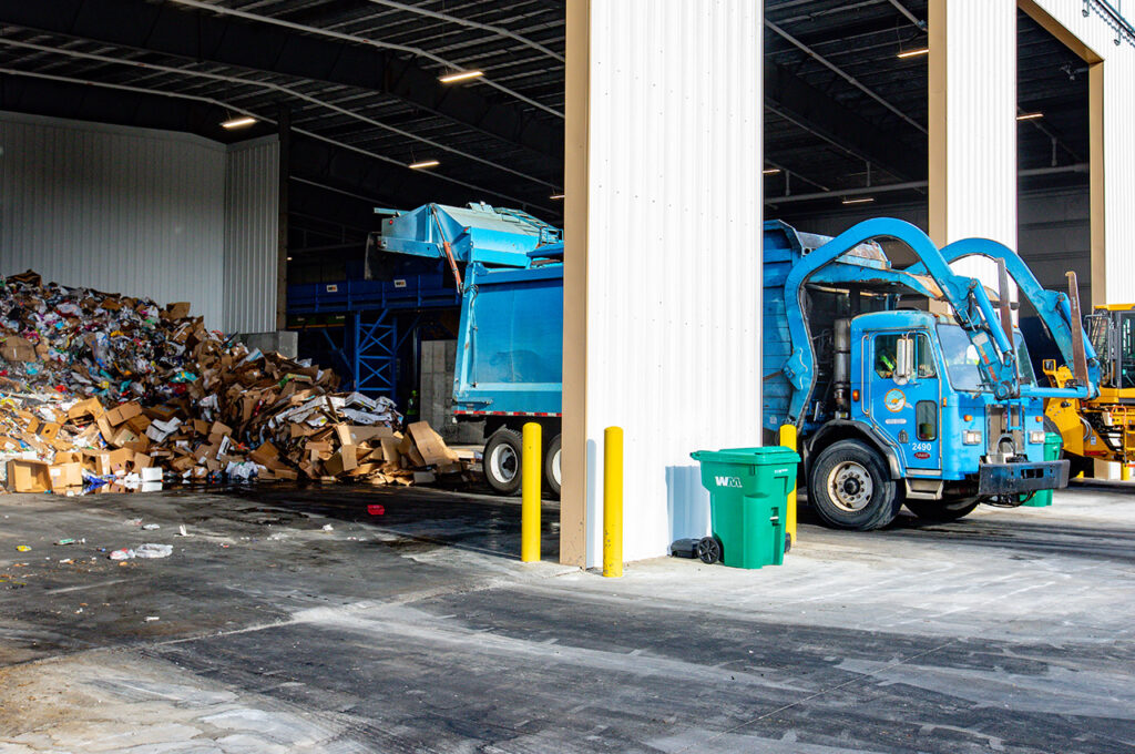 Waste Management Fort Walton dump truck in action