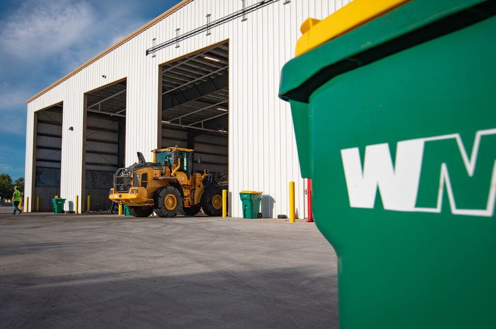 Waste Management Fort Walton facility with a tractor outside